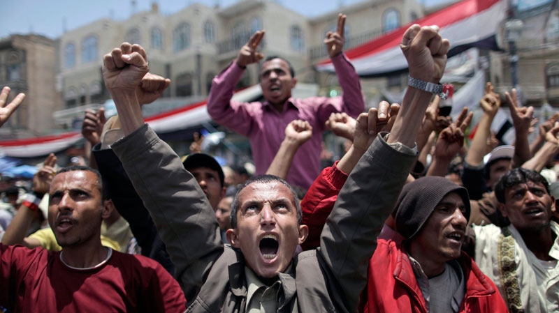 Anti-government protesters shout slogans during a demonstration demanding the resignation of Yemeni President Ali Abdullah Saleh, in Sanaa, Yemen, Wednesday, April 27, 2011. (AP / Muhammed Muheisen)