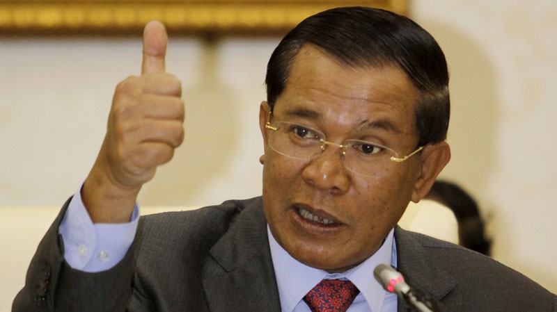 Cambodia's Prime Minister Hun Sen gestures during a press conference in the Peace Palace in Phnom Penh, Cambodia, Thursday, Feb. 17, 2011. (AP / Heng Sinith)