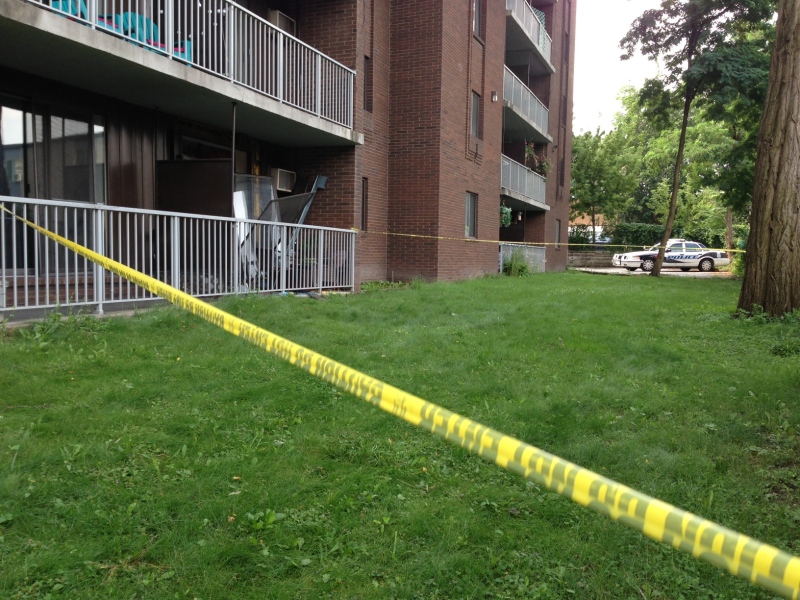 Police tape surrounds a ground-level apartment unit after an explosion on Detroit Street in Windsor, Ont., on Tuesday, July 16, 2013. (Sacha Long / CTV Windsor)