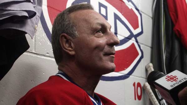 Guy Lafleur, Montreal Canadians retired NHL hockey star, takes a break in the dressing between period as he plays his last game of old timers hockey in his hometown of Thurso, Quebec, Sunday December 12, 2010. (Fred Chartrand / THE CANADIAN PRESS)