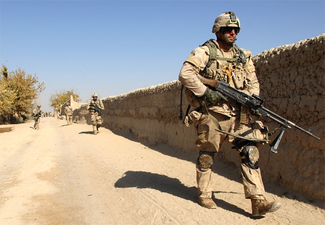 Unidentified Canadian soldiers patrol in the Zhari district, just west of Kandahar City last year. (Canadian Forces Combat Camera)