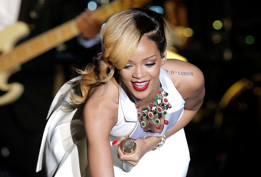 Rihanna sues Topshop's owner over use of her image on T-shirt