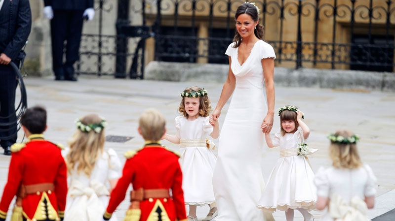 Maid of honour Pippa Middleton arrives with ring bearers Westminster Abbey at the royal wedding in London Friday, April 29, 2011. (AP / Alastair Grant)