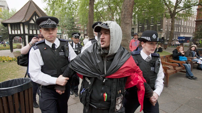 Police detain a man planning to demonstrate near where the Royal Wedding  between Britain's Prince William and Kate Duchess of Cambridge was taking place, Friday, April, 29, 2011. (AP / Karel Prinsloo)