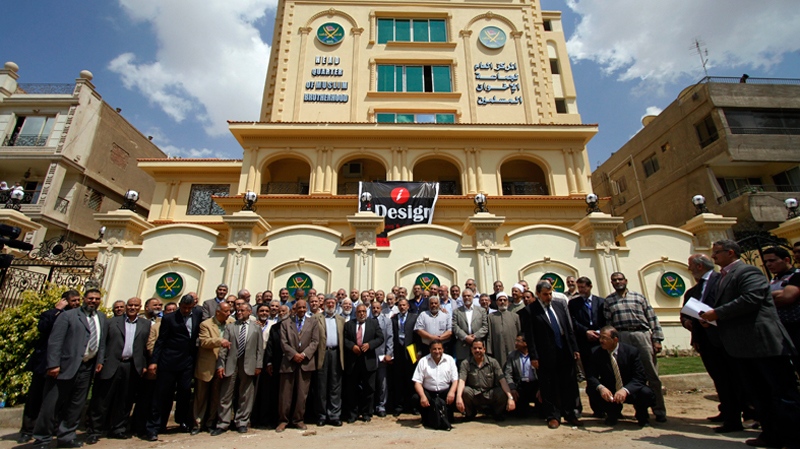 Egyptian Muslim brotherhood Shura council members gather to be photographed outside the new Muslim brotherhood headquarters in Cairo, Egypt, April 30, 2011. (AP / Khalil Hamra)