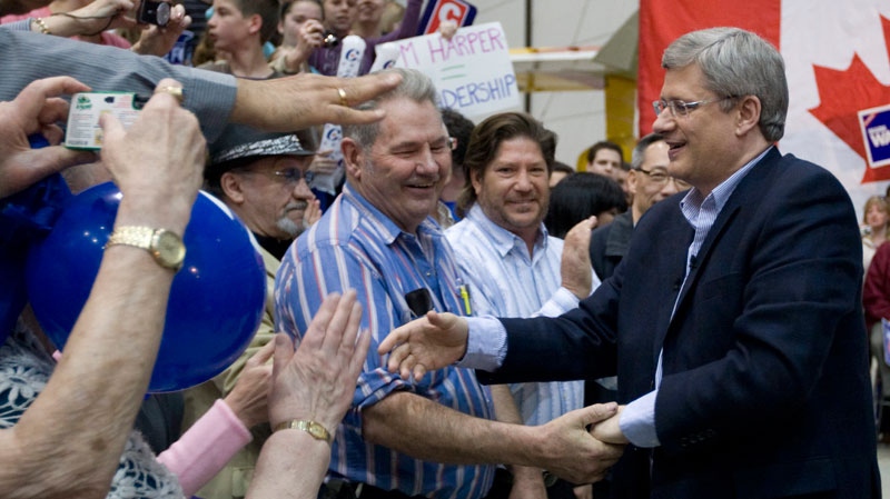 Stephen Harper shakes hands with supporters at his final campaign rally in Abbotsford, B.C., Sunday, May 1, 2011. (Adrian Wyld / THE CANADIAN PRESS)