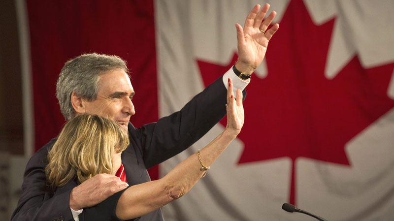 Liberal Leader Michael Ignatieff and his wife Zsuzsanna Zsohar takes the stage Monday, May 2, 2011 in Toronto.(Frank Gunn /  THE CANADIAN PRESS)