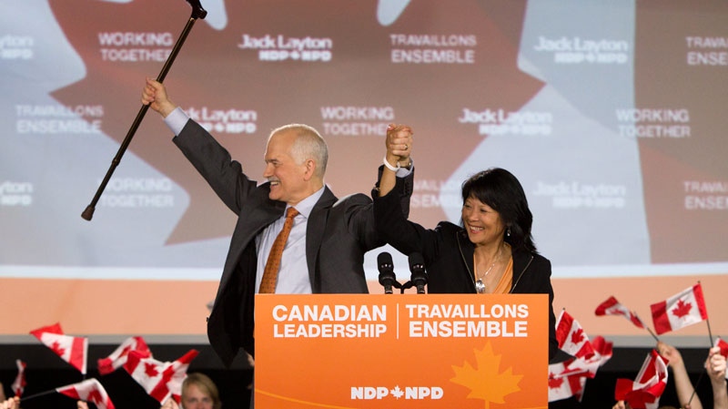 New Democratic Party leader Jack Layton and wife Olivia Chow celebrate their victories at NDP headquarters in Toronto on Monday, May 2, 2011. (Darren Calabrese / THE CANADIAN PRESS)
