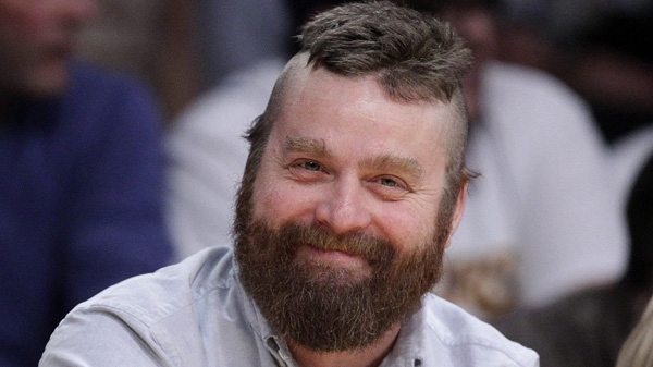 Actor Zach Galifianakis watches the first half of an NBA basketball game between Los Angeles Lakers and the Minnesota Timberwolves in Los Angeles, Friday, March 18, 2011. (AP Photo)