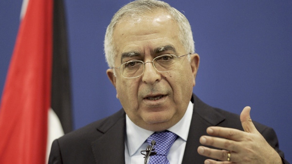 Palestinian Prime Minister Fayyad speaks at a news conference in the West Bank city of Ramallah, Thursday, April 14, 2011. (AP Photo/Majdi Mohammed)