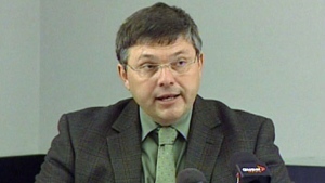 Tim Korol, a former special advisor to the deputy minister of Social Services, speaks at a news conference in Regina on Wednesday.