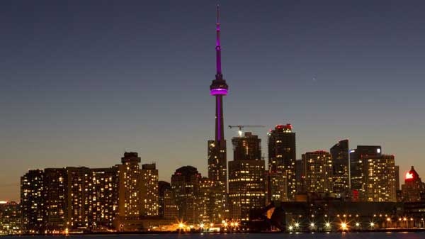 The Toronto city skyline is pictured moments before the start of Earth Hour on Saturday March 26, 2011. Buildings and homes across the country are going dark as Canadians take part in the fifth annual Earth Hour. (Chris Young / THE CANADIAN PRESS)