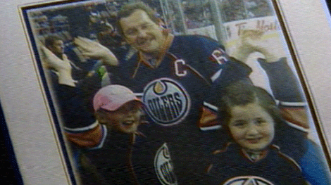 Oilers fan John Baxter with his two daughters Julianne and Coral 