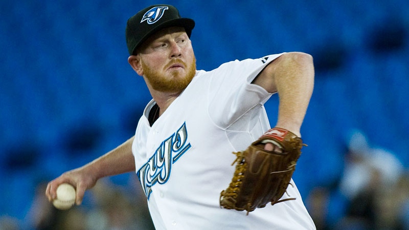 Toronto Blue Jays starting pitcher Jesse Litsch throws a pitch against the Detroit Tigers during first inning AL baseball action in Toronto on Friday, May 6, 2011. (Nathan Denette / THE CANADIAN PRESS)