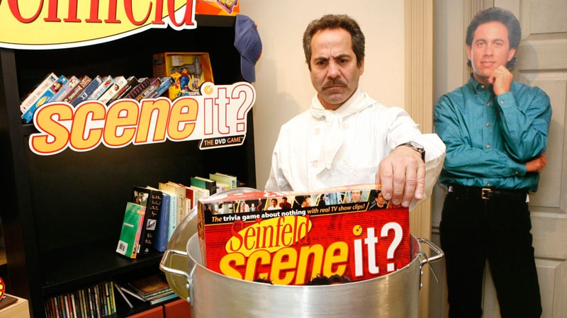 Larry Thomas, best known for his role as the "Soup Nazi" on Seinfeld, unveils the new Scene It? Seinfeld DVD Game from Mattel, Monday, Feb. 18, 2008, at the 105th Annual American International Toy Fair in New York. (AP Photo/Diane Bondareff, Mattel)