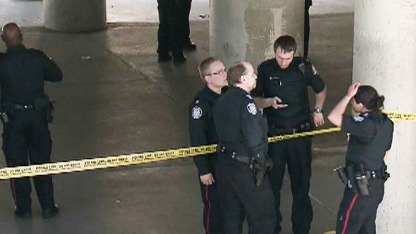 Police investigate a shooting at Scarborough Town Centre's bus station on Monday, May 9, 2011.