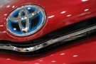 The emblem of a Toyota car shines at Toyota Motor Corp.'s showroom Toyota Mega Web in Tokyo Friday, Aug. 2, 2013. (AP / Itsuo Inouye)