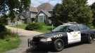 Opp car outside Howard and Melissa Richmond's Winchester home. 