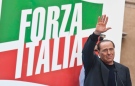 Silvio Berlusconi appears moved as he salutes his supporters during a demonstration organized by PDL party for its leader, in front of his residence in Rome, Italy, Sunday, Aug. 4, 2013. (AP / Mauro Scrobogna) 