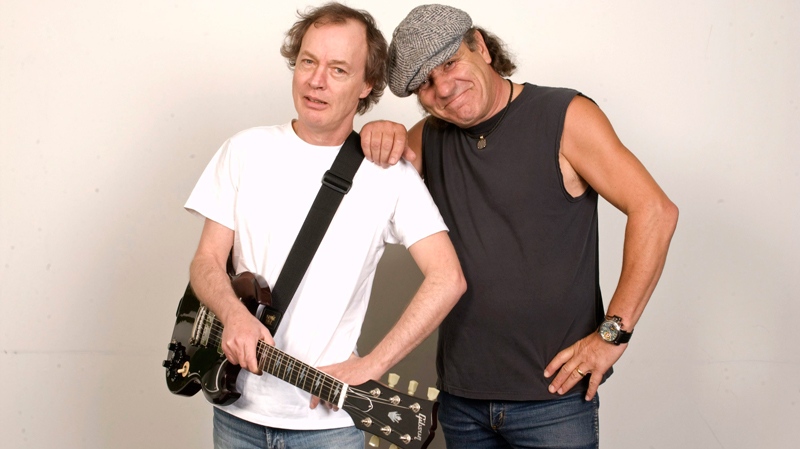 Angus Young, left, and Brian Johnson of AC/DC are photographed in New York, Sept. 9, 2008. (AP / Jim Cooper)