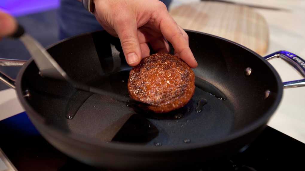 Scientists grill first lab-grown burger 