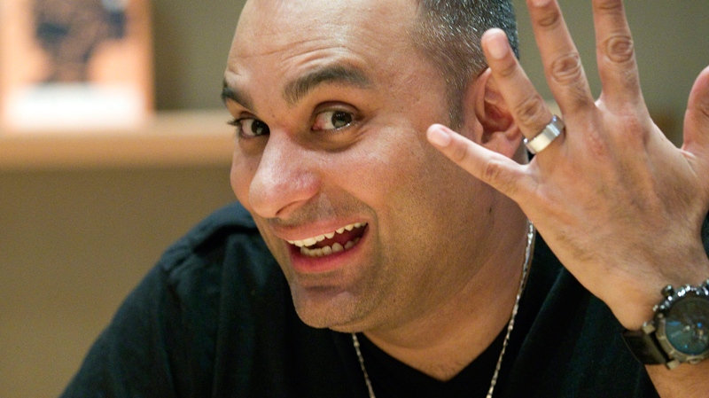 Russell Peters shows off his wedding ring during an interview in Toronto on Tuesday, Oct. 25, 2010. (Frank Gun / THE CANADIAN PRESS)  