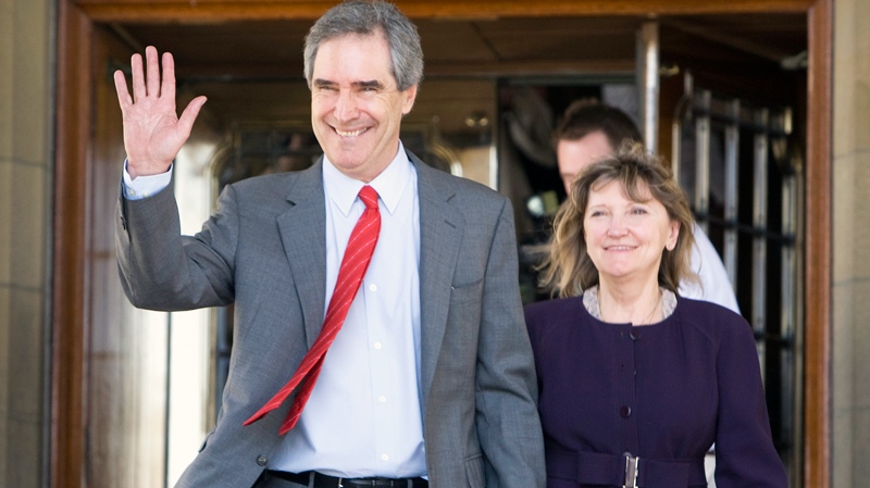 Outgoing Liberal Leader Michael Ignatieff waves as he leaves Parliament Hill with his wife Zsuzsanna Zsohar following a party caucus meeting in Ottawa, Wednesday, May 11, 2011. (Adrian Wyld / THE CANADIAN PRESS)
