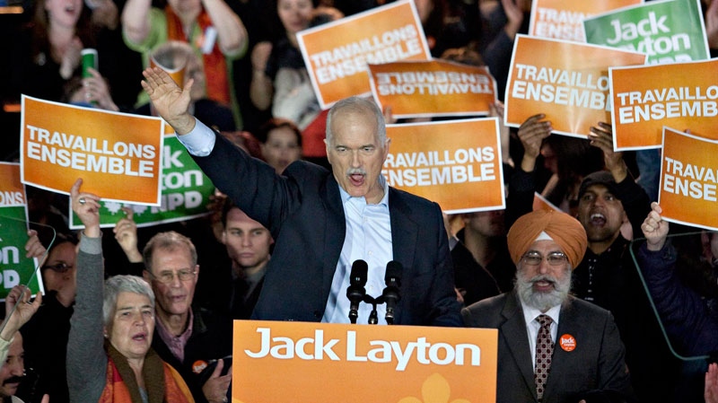 NDP Leader Jack Layton waves to his largest crowd yet in the province of Quebec in Montreal, Saturday, April 23, 2011. (Jacques Boissinot / THE CANADIAN PRESS)