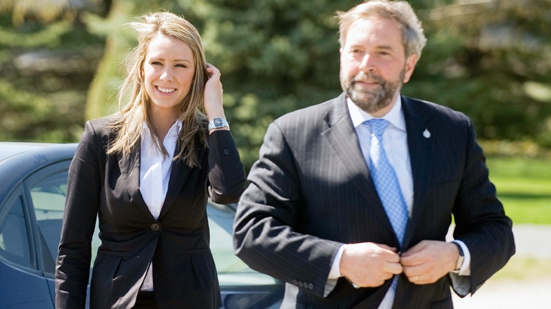 NDP MP elect for the riding of Berthier-Maskinonge Ruth Ellen Brosseau smiles with NDP deputy leader Thomas Mulcair as she visits the town of Saint Justin, Que., Wednesday, May 11, 2011. (Graham Hughes / THE CANADIAN PRESS)