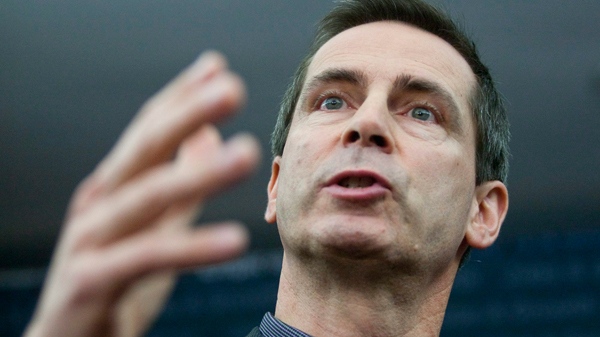 Premier Dalton McGuinty gestures as he speaks to members of the media in Ottawa on Friday, February 4, 2011. (Pawel Dwulit / THE CANADIAN PRESS)