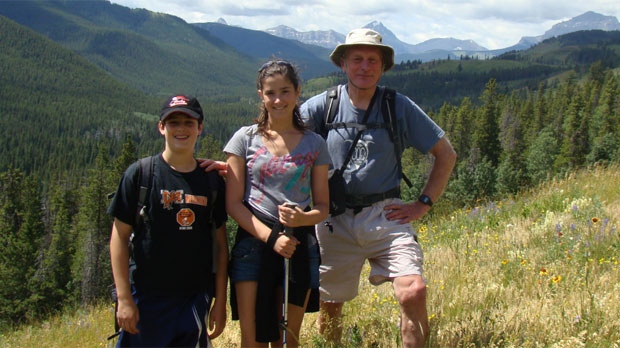 Peter Aitchison (right) is shown in a family photo with his grandchildren. The climber died from a fall on Aug. 7 at Mount Victoria in Banff National Park.