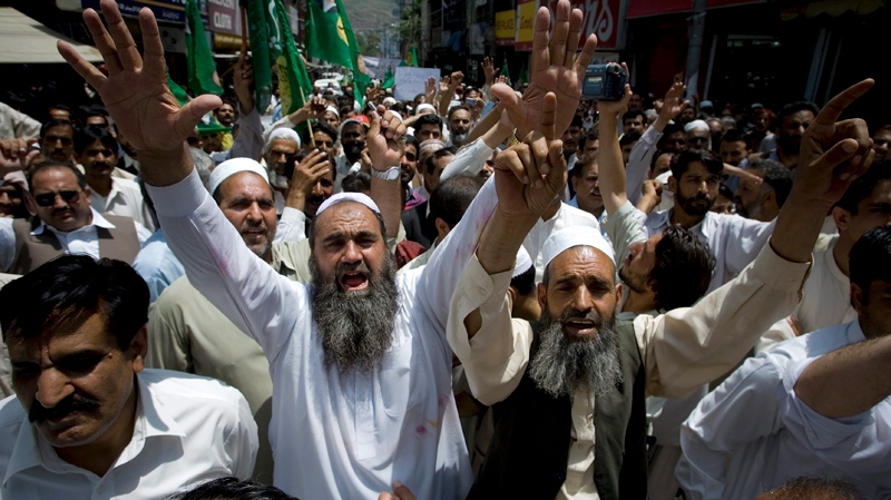 Supporters of a Pakistani opposition group Pakistan Muslim League-N party chant slogan during an anti U.S. rally in Abbottabad, Pakistan on Thursday, May 12, 2011. (AP / Anjum Naveed)