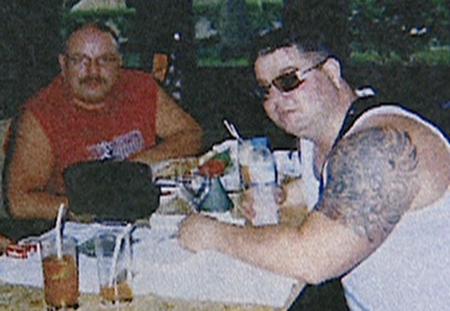 Douglas Vanalstine and Clayton Rouche are seen in Vietnam in this undated file image.
