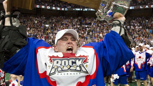 Toronto Rock goaltender Bob Watson hoists the National Lacrosse League trophy after defeating the Washinton Stealth 8-7 in the championship game in Toronto on Sunday May 15, 2011. Watson earned the MVP honours in his final pro lacrosse game. THE CANADIAN PRESS/Frank Gunn