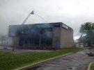 A massive blaze at Argos Carpets on Merivale Road has caused $5 million in damage, including $3 million to the building.