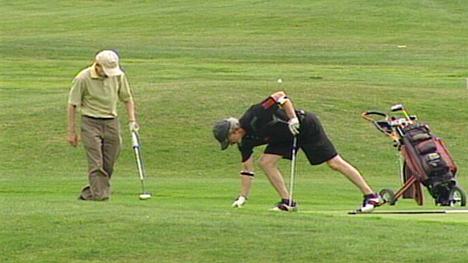 Men playing golf at Pine View
