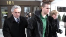 Former Newfoundland and Labrador premier Brian Tobin (left) and wife Jodean Tobin (right) escort their son Jack Tobin (centre) out of Ottawa court in this file photo from December 25, 2010. THE CANADIAN PRESS/Pawel Dwulit