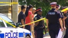 Police remain on the scene of a fatal shooting in Mississauga, Saturday, Aug. 17, 2013.
