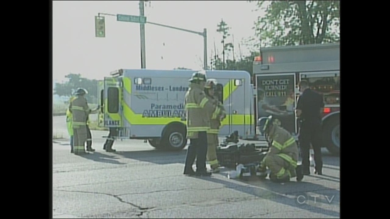 Emergency crews attend a motorcycle crash on Colonel Talbot Road in London, Ont., on Monday, Aug. 19, 2013. (CTV Windsor)