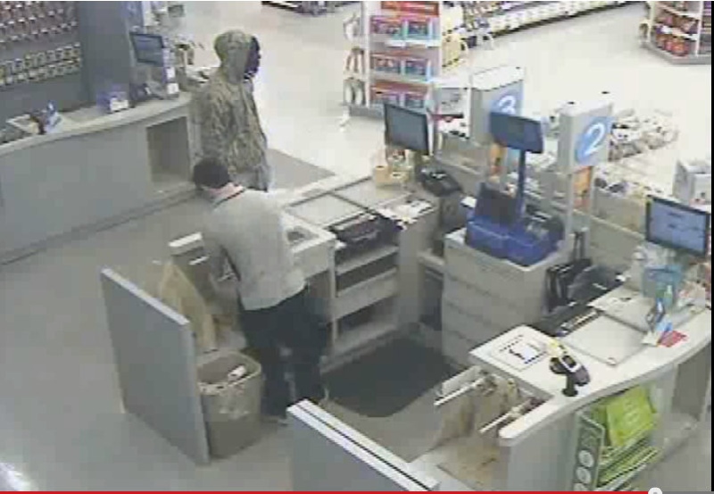 Windsor police released security video of a suspect wanted in a Shoppers Drug Mart robbery. 