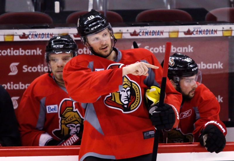 Ottawa Senators Jason Spezza stands in front of Milan Michalek, left, and Cory Conacher, right, during the team's practice at Scotiabank Place ahead of game five of their Stanley Cup Eastern Conference semi-final NHL hockey game against the Pittsburgh Penguins in Ottawa on Tuesday, May 21, 2013. (Patrick Doyle / THE CANADIAN PRESS)