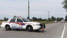 York Regional police investigate the scene of a collision between a vehicle and a cyclist on the York-Durham Line near Whitchurch-Stouffville.