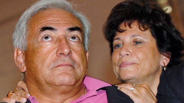 Then French Socialist Party leader Dominique Strauss-Khan, left, and his wife Anne Sinclair are seen in this Aug. 27, 2006 file photo at the French Socialist summer meeting in La Rochelle, southwestern France. Anne Sinclair is sacrificing millions of her family's fortune on her husband's bail and house arrest. (AP / Bob Edme, File)