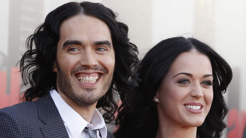 British actor Russell Brand and his wife Katy Parry arrive for the European premiere of Arthur, in London, Tuesday, April 19 2011.(AP Photo/Joel Ryan)