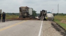A tractor-trailer and tanker truck crashed, killing the driver of the tractor-trailer, near Rothsay, Ont. on Tuesday, Aug. 27, 2013.