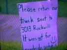 A Windsor family put a sign on their front lawn after an expensive item was picked up in Windsor, Ont., on Tuesday, Aug. 27, 2013. (Rich Garton / CTV Windsor)