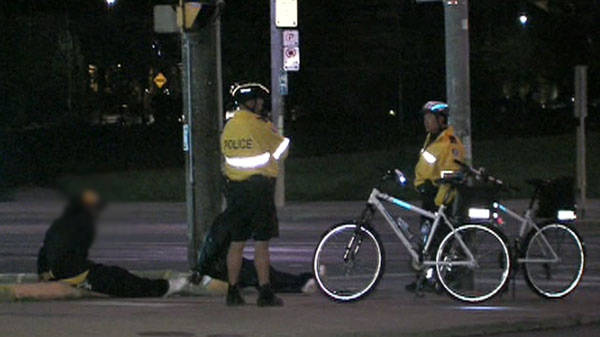 Toronto police make an arrest on Queen Street East near Kingston Road on Monday, May 23, 2011.