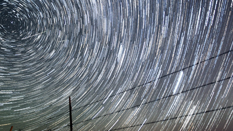 Perseid meteors, upper left, streak past time-laps