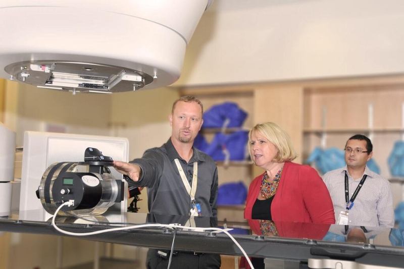Health Minister Deb Matthews looks at a new Varian TrueBeam linear accelerator radiation therapy machine in this image provided by the London Health Sciences Centre on Tuesday, Sept. 3, 2013.