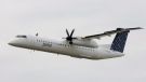 The first Porter Airlines plane does a fly past at the city centre airport in Toronto, Tuesday Aug. 29, 2006. (Adrian Wyld / THE CANADIAN PRESS)